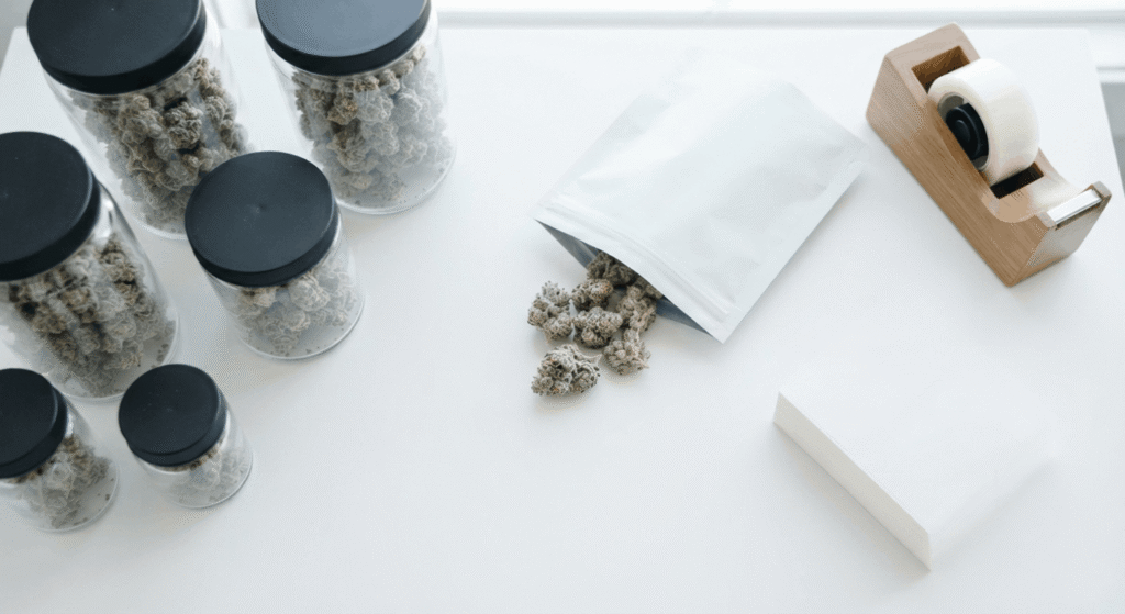 THCA flower buds in blank white label jars and mylar packaging for wholesale branding